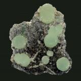 Prehnite and calcite
Prospect Park Quarry, Prospect Park, Passaic County, New Jersey, USA
7.9 x 6.9 cm
Prehnite spheres to 1.7 cm with micro calcite crystals (Author: Frank Imbriacco)