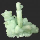 Prehnite
Upper New Street Quarry, Paterson, Passaic County, New Jersey, USA
9 x 9 cm
A 6 cm prehnite epimorph after anhydrite centered among smaller epimorphs (Author: Frank Imbriacco)