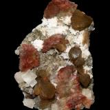 Heulandite and stilbite
Prospect Park Quarry, Prospect Park, Passaic County, New Jersey, USA
7.8 x 5.4 cm
Red heulandite crystals to 1.8 cm with stilbite, calcite and laumontite (Author: Frank Imbriacco)