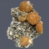 Stilbite and heulandite
Weldon Quarry, Watchung, Somerset County, New Jersey, USA
11.2 x 8.8 cm
Stilbite spheres to 3.5 cm with heulandite, albite, and calcite (Author: Frank Imbriacco)