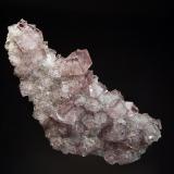 Fluorite
Blackdene Mine, Ireshopeburn, Weardale, Durham, England
5.2 x 10.5 cm.
Glassy pale lilac-colored crystals to 1.2 cm on limestone matrix. (Author: crosstimber)