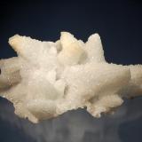 Quartz casts after calcite
Droujba Mine, Laki District, Plovdiv Oblast, Bulgaria
7.1 x 10.0 cm.
Scalenohedral calcite crystals to 3.5 cm. epimorphed by quartz. The calcite has been completely dissolved away leaving thin hollow shells. (Author: crosstimber)