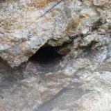 a pocket in the granite that yeilded many find smokys and a few clear quartz crystals (Author: thecrystalfinder)