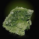 Millerite and Siegenite. Eugènia Mine.
Specimen size: 4 x 3,5 x 3,5 cm. 
Jordi Fabre Collection.
Fabre Minerals Photo. (Author: Joan Rosell)