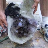 Cleaned plate of smokey/amethyst crystal plate(light purple in some of the crystals.  This will be a cool piece as the main crystals will be completely surrounded by snow white druzy.  There is still some manganese that I need to get off with acid (Author: Jason)