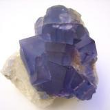 Fluorite on matrix from Blanchard Mine, Bingham, New Mexico, USA.
8 x 8 cm. Main cube: 2 cm edge (Author: Antonio Alcaide)