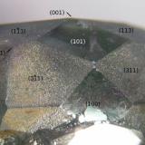 Side view (taken through the microscope), faces labelled with their Miller indices. Field of view 15x11.5mm. (Author: Gerhard Niklasch)
