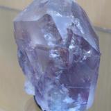 Naica spinel twinned fluorite...with large enhydro.  8 cm across (Author: Peter Megaw)