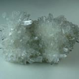 A specimen of the colorless quartz crystals, 6 cm across. (Author: John S. White)