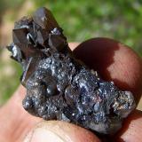 An interesting specimen of quartz, coated with hematite? manganese? Robertson, WC. (Author: Pierre Joubert)