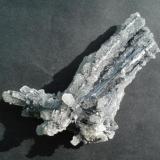 Stibnite on and covered with quartz
Kadamjai mine
8 x 3 cm (Author: alex chaus)