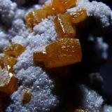 Wulfenite.
Probably  Los Lamentos, Mun de Ahumada, Chihuahua, Mexico.
Wulfenite to 9 mm (Author: nurbo)