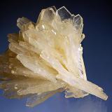 Barite
Gheturi Mine, Turt, Satu Mare, Romania
5.5 x 6.1 cm.
Fan-shaped cluster of pale yellow barite crystals with transparent terminations.  Mined in 2000. (Author: crosstimber)
