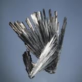 Stibnite
Herja Mine, Baia Mare, Maramures Romania
4.8 x 6.3 cm.
Interconnected fan-shaped sprays of steel-gray stibnite with low angled terminations. (Author: crosstimber)