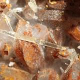 Mimetite on quartz
Tsumeb, Namibia
7 mm
Long elongated double terminated crystal. The whole specimen is 10 cm. (Author: Herman van Dennebroek)
