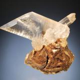 Gypsum
Boldut Mine, Cavnic, Maramures, Romania
8.0 x 9.0 cm.
Colorless, transparent crystals to 8.0 cm in length on light brown siderite. Collected in 1990. (Author: crosstimber)