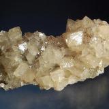 Smithsonite
Tsumeb Mine, Tsumeb, Namibia
4.0 x 7.8 cm.
Pale tan rhombs of smithsonite to 1.2 cm. (Author: crosstimber)