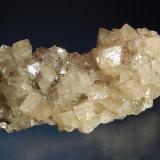 Smithsonite
Tsumeb Mine, Tsumeb, Namibia
4.0 x 7.8 cm.
Pale tan rhombs of smithsonite to 1.2 cm. (Author: crosstimber)