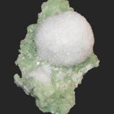 Mesolite & prehnite
Prospect Park Quarry, Prospect Park, Passaic County, New Jersey, USA
15.5 x 9.9 cm
A 6.7 cm mesolite sphere on prehnite, formerly in the U.S. National Museum, and pictured on p.178 of the May-June 1978 issue of the Mineralogical Record. (Author: Frank Imbriacco)