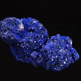 Azurite
Los Olivos Mine, Chihuahua, Mexico
2.8 x 5.9 cm.
Dennis Beals, the proprietor of XTAL, had a small batch of these attractive azurites from a mine that I’d never heard of. The location is listed on Mindat along with a couple of azurite photos, so although the location is not entirely new, I’m hoping that the current batch represents good things to come from there in the future. (Author: crosstimber)