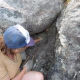 Riana busy removing part of a large quartz pocket. (Author: Pierre Joubert)