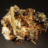 Stibiconite ps. after stibnite
La Bufa Mine, Catorce, San Luis Potosi, Mexico
7.8 x 9.0 cm.
Prismatic crystals of stibnite replaced by yellowish-tan stibiconite on a quartz matrix. (Author: crosstimber)