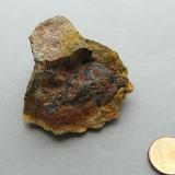 Uraninite, Gummite
Ty Gallen Mine, Morbihan, Brittany Area, France.
45*30 mm

Uraninite (black) with Gummite (brown and yellow) (Author: Benj)
