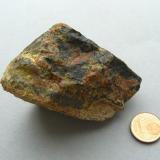 Uraninite, Gummite
Ty Gallen Mine, Morbihan, Brittany Area, France.
70*50 mm

Uraninite (black) with Gummite (brown and yellow) (Author: Benj)