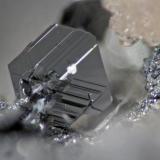 Pearceite
Las Cruces mine, Gerena, Seville, Andalusia, Spain
FOV 1.5 mm
Beautiful pearceite crystal, with harmotome (upper right). The matrix is chalcocite-djurleite. (Author: Cesar M. Salvan)