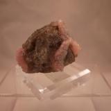 Quartz variety rose Quartz on smoky Quartz
Paroon, Afghanistan
9 x 6.3 x 6.5 cm (Author: Don Lum)