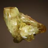 Vesuvianite
Jeffrey Mine, Asbestos, Estrie, Quebec, Canada
5.5 x 6.0 cm.
Intergrown, partly gemmy, lustrous apple green vesuvianite crystals. (Author: crosstimber)