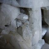 Millerite in and on Calcite.
Hockley Edge, Near Ashover, Derbyshire, England, UK.
FOV 30 x 25 mm approx (Author: nurbo)