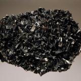 Manganite
Caland Pit, Atikokan, Hutchinson Township, Rainy River District, Ontario, Canada
6.0 x 8.0 cm.
Lustrous black bladed manganite crystals covering the top of massive manganite. (Author: crosstimber)