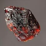 Spessartine
Pederneira Mine, São José da Safira, Minas Gerais, Brazil
4.0 x 4.7 cm.
Gemmy wine red spessartine crystal with a stepped surface indicative of very fast growth. (Author: crosstimber)