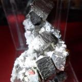 Pyrite and quartz
Bucium, Romania
5 cm (about 1 cm main crystal) (Author: David)