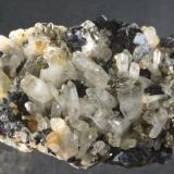 Quartz, sphalerite, pyrite.
Harding Vein, Carrock Mine, Caldbeck Fells, Cumbria, UK.
15 cm specimen, quartz to 3 cm, sphalerite to 2 cm. (Author: Ru Smith)