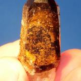 Smoky quartz
Mount Malosa, Zomba, Malawi.
44 x 17 x 12 mm
Smoky quartz with a variety of mineral inclusions. (Author: Pierre Joubert)