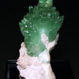 Apophyllite-(KF) with Stilbite-Ca
Pashan quarries, Pashan, Pune District, Maharashtra, India
4.5 cm tall
The apophyllites reach 2.5 cm in length.  The very tip of the main crystal is cleaved. Collected in the late 1970s to early 1980s. (Author: Tim Blackwood)