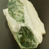 Mica
Oh Saung Taung, Le-Oo (Le U), W of Mogok, Burma.
23 mm crystals in 5 cm calcite matrix.
Green mica. (Author: Ru Smith)