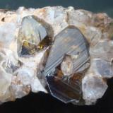 Andradite variety Demantoid
Antetezambato, Ambanja, Antsiranana, Madagascar
9,8 x 4,0 x 3,0 cm 
crystals ~2,0 X 1,5 x 0,8  & ~1,0 x 1,7 x 1,2 cm
Detail of the same specimen (Author: Jacquou HO)
