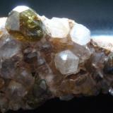 Andradite variety Demantoid
Antetezambato, Ambanja, Antsiranana, Madagascar
9,8 x 4,0 x 3,0 cm 
crystals ~2,0 X 1,5 x 0,8  & ~1,0 x 1,7 x 1,2 cm (Author: Jacquou HO)