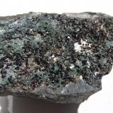 Cassiterite and chlorite
Camborne district, Cornwall, United Kingdom.
13.7x9x7.5 cm. (Author: Edelmin)