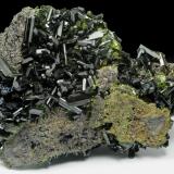 Epidote
Khowrin Mount, Kohandan (East of Tafresh), central Iran
The length of largest crystal in upper left is 1cm. (Author: vhairap)