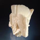 Quartz ps. anhydrite
Irai, Alto Uruguai Region, Rio Grande do Sul, Brazil
5.5 x 8.5 cm.
Fan-shaped casts of anhydrite crystals completely replaced by cream-colored quartz. (Author: crosstimber)