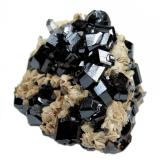 Cassiterite, siderite, quartz
Viloco Mine, Araca, Loayza, La Paz, Bolivia
 60 mm x 47 mm x 39 mm. Largest cassiterite crystal: 15 mm wide (Author: Carles Millan)