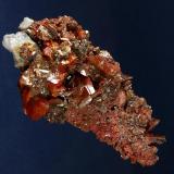 Wulfenite
Red Cloud Mine, Silver District, Trigo Mts., La Paz County, Arizona, USA
134 x 50 x 48 mm
From the 240&rsquo; Level, up to 22 mm Wulfenites. (Author: GneissWare)