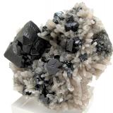 Cassiterite, quartz
Viloco Mine, Araca, Loayza, La Paz, Bolivia
80 mm x 69 mm x 39 mm. Largest cassiterite crystal: 33 mm wide (Author: Carles Millan)