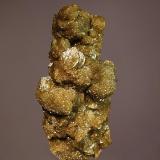 Siderite
Julcani Mine, Julcani District, Angaraes Province, Huancavelica Department, Peru
3.5 x 7.0 cm.
Brownish, flattened siderite rhombs stacked one on top of another and completely covering matrix. (Author: crosstimber)