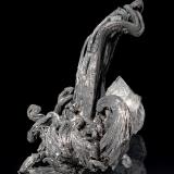 Silver
Himmelsfürst Mine, Brand-Erbisdorf, Freiberg District, Erzgebirge, Saxony, Germany
3,6x2,5x2 cm
Classic wire Silver associated with Calcite, from old collection. (Author: Simone Citon)