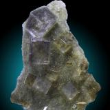 Fluorita, Cuarzo
La Cabaña, Zona Minera de Berbes, Ribadesella, Asturias, España
8 x 4 cm, cristales hasta 2cm
Ex Alain Martaud (Autor: Raul Vancouver)
